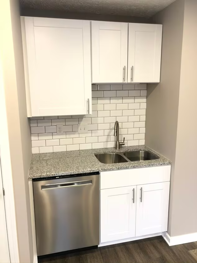 Kitchen sink and dishwasher area of 3551 Paxton Drive in Hilliard, Ohio